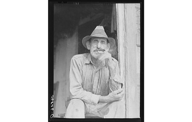 Isleño trapper taking a cigar break, Delacroix, 1941. Source: Library of Congress