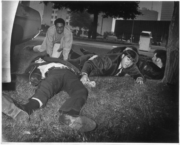 1973 - Police officer checks friend